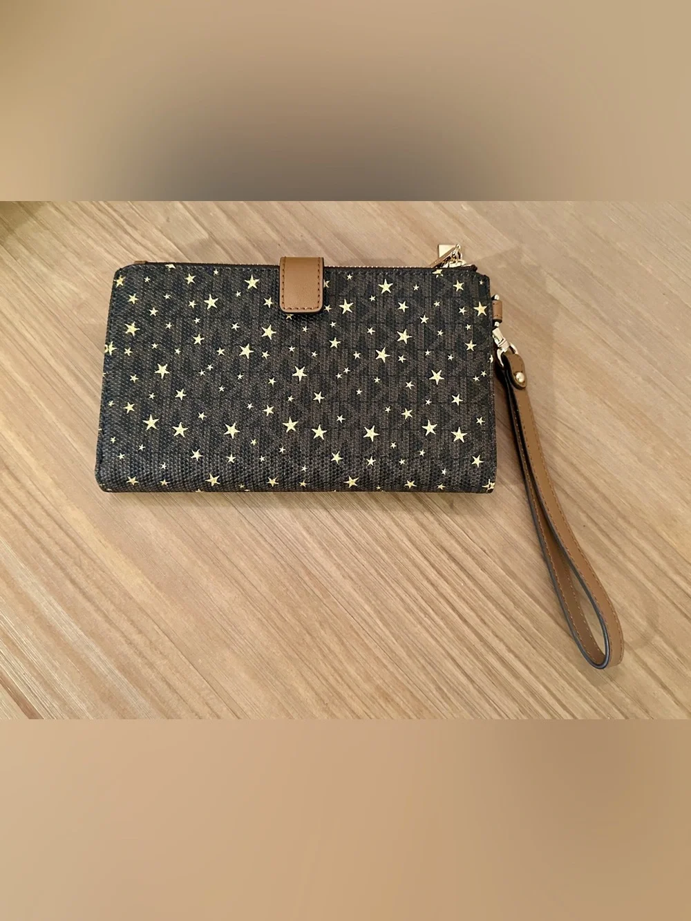 Michael Kors Black Star Print Wristlet with Tan Strap